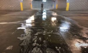 Burnaby Pressure Washing cleaning a parking garage